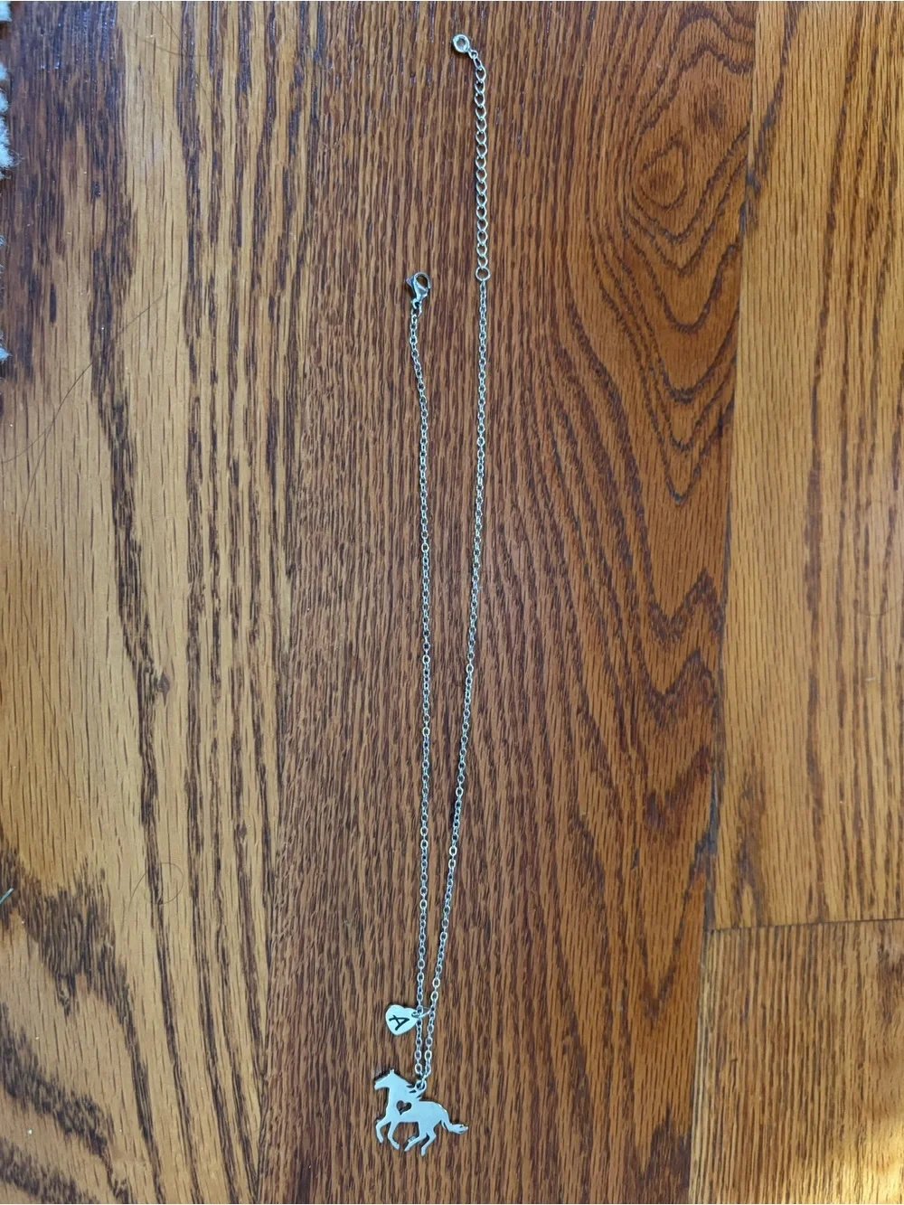 Silver necklace with horse pendant